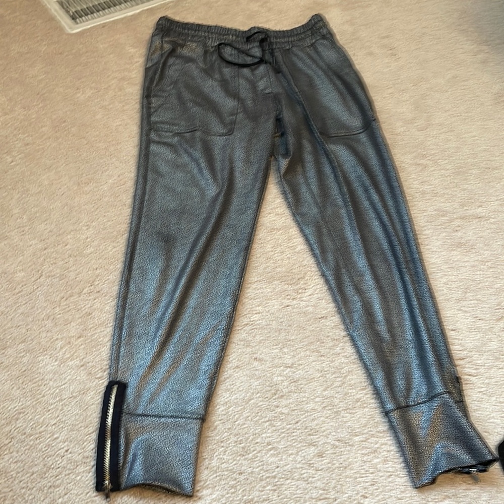 Funky silver pants.